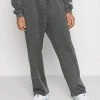 Mennace RECLAIM JOGGER UNISEX - Tracksuit Bottoms - Washed Black