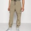 Mennace TECH TRACKSUIT BOTTOM - Cargo Trousers - Tan