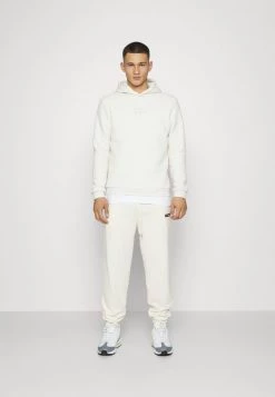Mennace REGULAR JOGGER - Tracksuit Bottoms - Off White -Mennace Shop Online 54d4c4eeb452409c890b09da780375a9