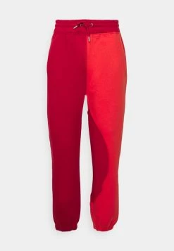 MENNACE WAVY SEAM JOGGER UNISEX - Tracksuit Bottoms - Red