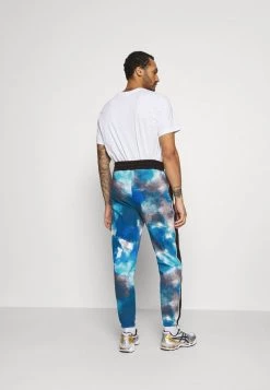 Mennace TIE DYE UNISEX - Tracksuit Bottoms - Blue -Mennace Shop Online a594be2d02d046199b79459fdf527c45