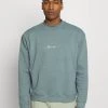 Mennace ESSENTIAL SIGNATURE HIGH NECK UNISEX - Sweatshirt - Petrol