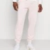 Mennace ON THE RUN UNISEX - Tracksuit Bottoms - Pink -Mennace Shop Online cf2dbd3191a74f57919b07009976f823