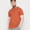 MENNACE UNISEX ESSENTIAL REGULAR - Basic T-shirt - Burnt Orange